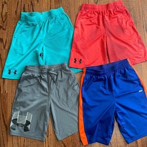 4 Under Armour boys yxl athletic shorts—set of 3 UA and 1 dsg brand.